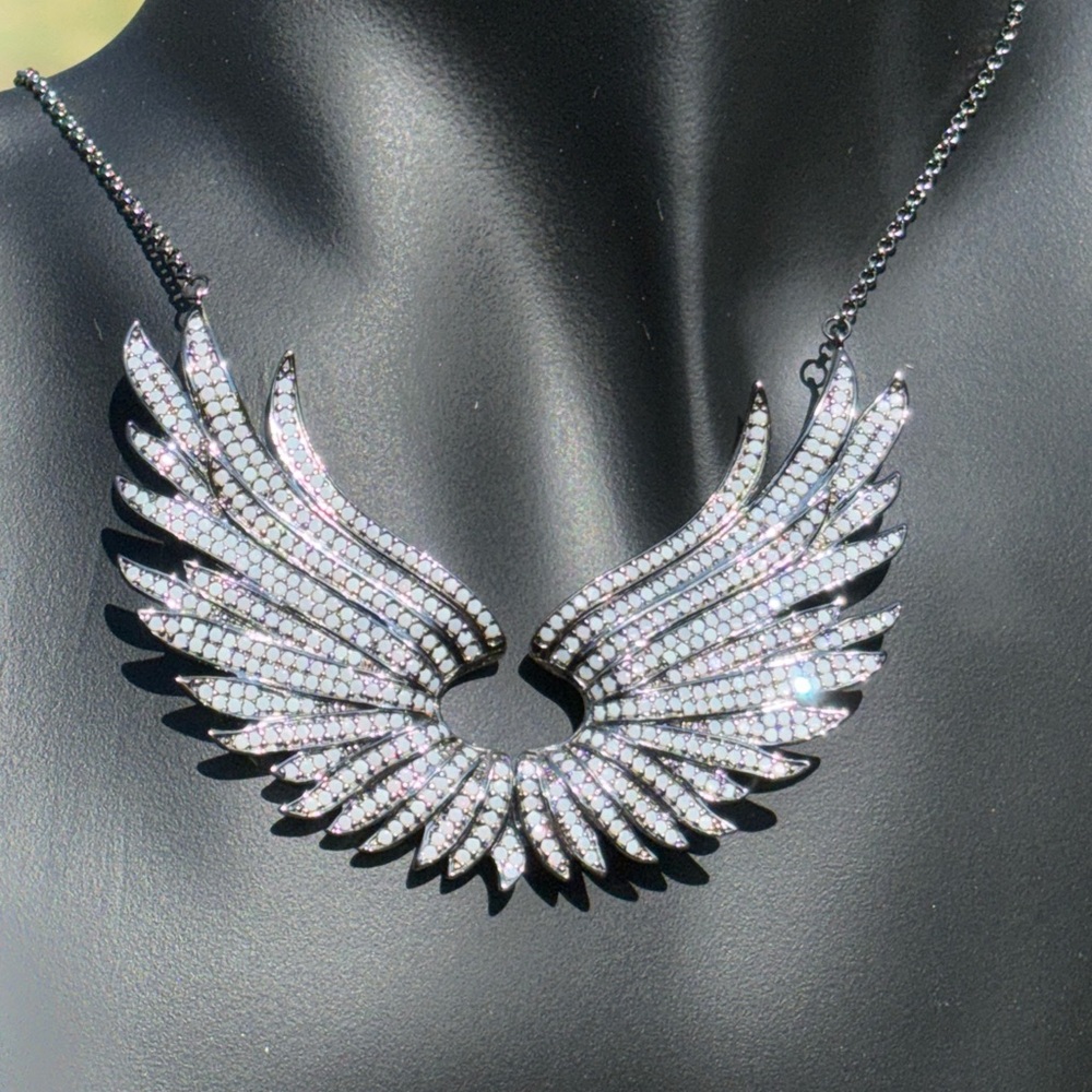 VTG  silver Angel Wing Pendant necklace encrusted with color changing moonstones